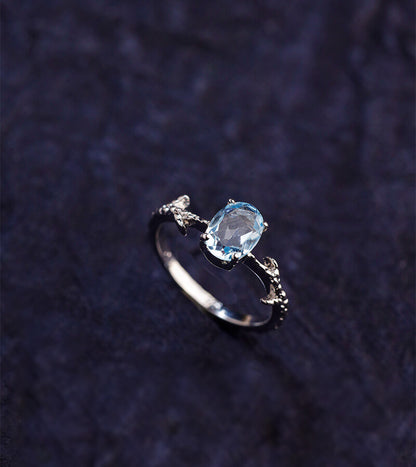 OVAL BLUE TOPAZ RING 92.5 SILVER